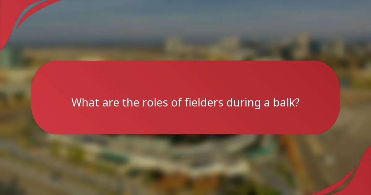 What are the roles of fielders during a balk?